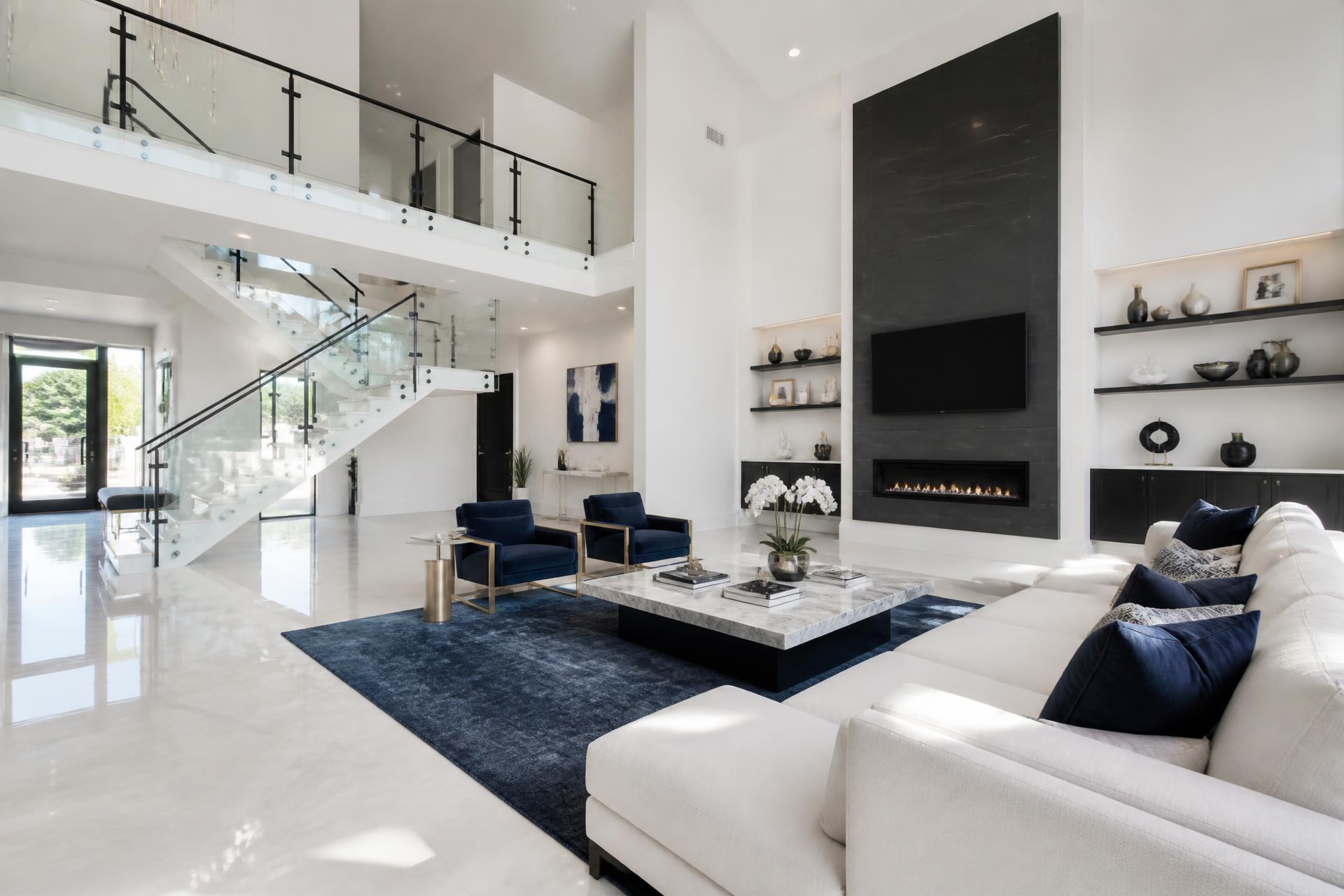 Spotless modern living room with navy and green Veluxe accents